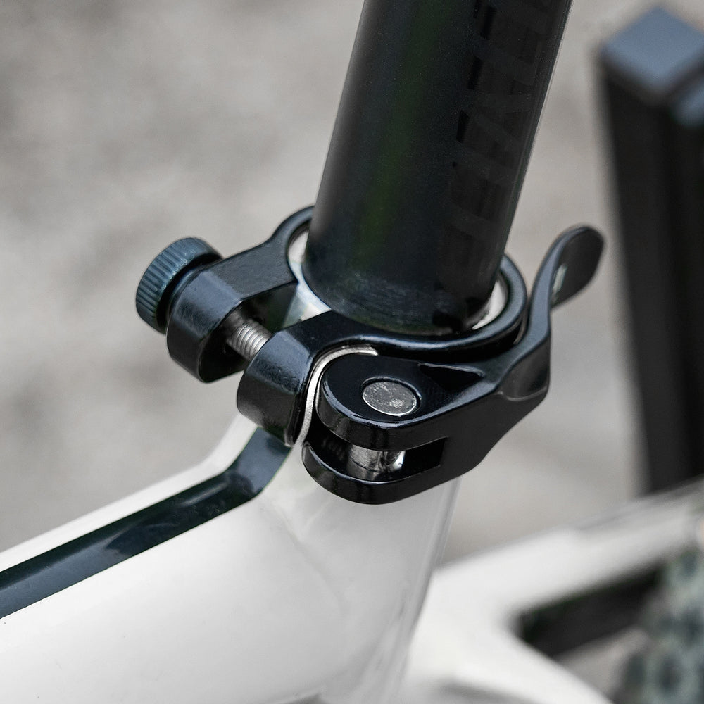 
                  
                    Adjustable Quick Release Seatpost Clamp - Corki Cycles
                  
                