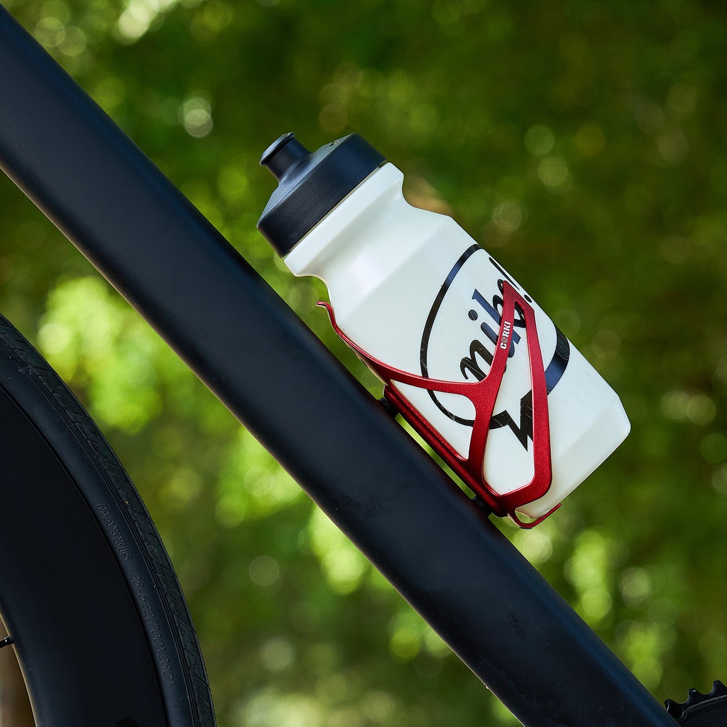 
                  
                    Aluminum Bicycle Water Bottle Cage - Center Cage Entry - Corki Cycles
                  
                